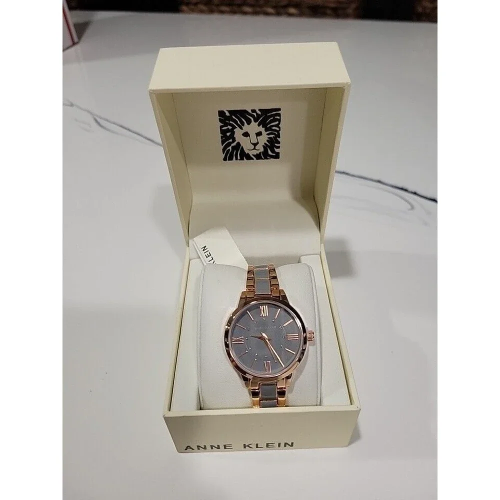 Anne Klein Women's Rose Gold-Tone and Light Pink Resin Bracelet Watch